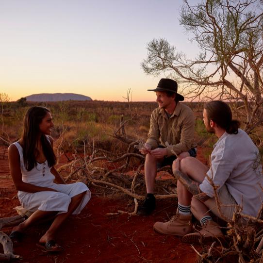 Couple with guide in the bush
