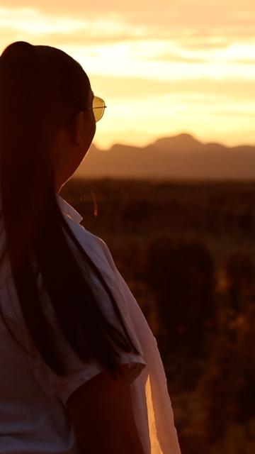 Two women looking out into the sunset